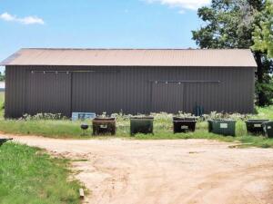 Warehouse/Manufacturing facility on major Hwy, concrete floor, 3,000sqft, bathroom, 3 phase electricity loading dock, outside city limits