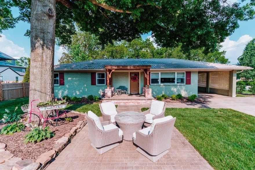 Rare opportunity! If you’ve dreamed of owning property within walking distance to the Bentonville Square, Now is your chance! This immaculate 3Br / 2.5Ba home has been professionally remodeled and designed. Currently a successful Airbnb. Spacious kitchen w/large amount of storage. One car carport. Great patio for outdoor entertaining. Sits on the corner of D St. and 2nd St. If you’re ready to invest in the Bentonville area, this property backs up to 404 SW 2nd St. (MLS #1225494) and the two can be bought together for only $1,500,000. No sign in yard.