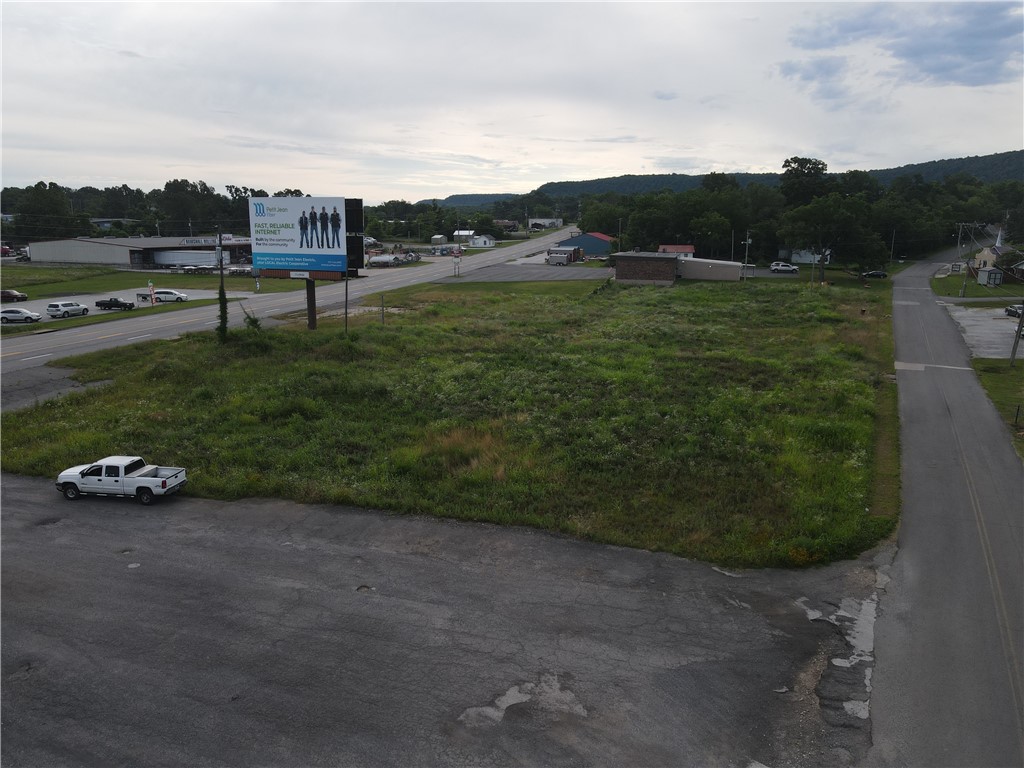 Discover the potential of 1.65 surveyed acres in the heart of Marshall, Arkansas. This prime property, located on Hwy 65, boasts exceptional visibility and easy access with paved access from 3 sides. Centrally positioned, it offers unparalleled exposure for businesses seeking a strategic location. Whether you’re looking to establish a new venture or expand an existing one, this site’s high-traffic location ensures your business gets noticed. With its convenient access to local amenities and transportation routes, this property stands out as a premier choice for commercial development in Marshall, Arkansas.