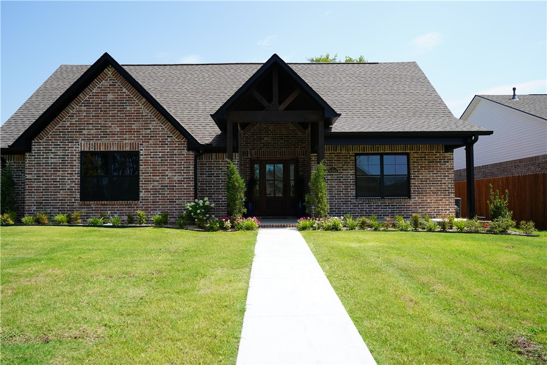 8301 McLaren Dr, Fort Smith, AR 72916 - Located in the distinguished Shire Glen at Chaffee Crossing Subdivision, this newly completed Justin Green Custom Home (2025) offers timeless craftsmanship, modern luxury, and an exceptional floor plan designed for today's lifestyle. This 3-bedroom, 2-bathroom-perfect for entertaining and everyday living. The primary suite is a true retreat, featuring a spa-inspired bath and the convenience of direct access from the custom closet to the designer laundry room. Situated on a prime corner lot, the home also boasts a side-entry, oversized 2-car garage, adding both curb appeal and functionality. With Justin Green Custom Homes' reputation for honesty and integrity, this property represents not only a home but also a lifestyle investment in one of Fort Smith's most distinguished communities. As an added assurance, Justin Green is offering a 3-year limited builder home warranty- "Quality backed by its Builder."