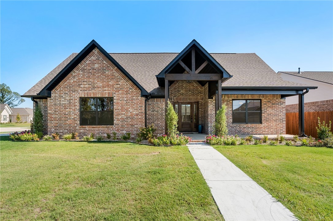 8301 McLaren Dr, Fort Smith, AR 72916 - Located in the distinguished Shire Glen at Chaffee Crossing Subdivision, this newly completed Justin Green Custom Home (2025) offers timeless craftsmanship, modern luxury, and an exceptional floor plan designed for today's lifestyle. This 3-bedroom, 2-bathroom-perfect for entertaining and everyday living. The primary suite is a true retreat, featuring a spa-inspired bath and the convenience of direct access from the custom closet to the designer laundry room. Situated on a prime corner lot, the home also boasts a side-entry, oversized 2-car garage, adding both curb appeal and functionality. With Justin Green Custom Homes' reputation for honesty and integrity, this property represents not only a home but also a lifestyle investment in one of Fort Smith's most distinguished communities. As an added assurance, Justin Green is offering a 3-year limited builder home warranty- "Quality backed by its Builder."