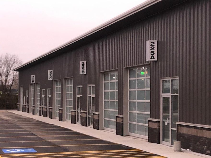 6 glass operable overhead doors, brick wainscot, dumpster enclosure, mail box for each tenant, 42 parking spaces in front with gated parking behind building.  Also portfolio listing ML #: 129488. 
Fully Leased - YR 1 GOI: $131,740.48, Cap Rate YR 1: 8.47%