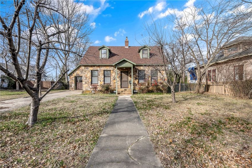 There is so much opportunity for this historic home that is just five blocks from the downtown Bentonville square where all the excitement begins! This is your chance to own a home in a beautiful and fast growing highly desirable area.  Restaurants, shopping, bike trails, museums, music and more are all just minutes away.  The home has frontage on both Central and NW 2nd Street.   Lovely 3 bedroom 2 bath home and 2 living areas  with real wood floors and 3 gas log fireplaces that could be converted to wood burning.  The kitchen has recently been completely  upgraded with lovely countertops, cabinets, self close drawers,  gas range, dishwasher, flooring and much more.