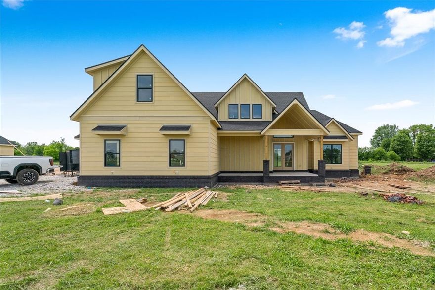 Look forward to coming home to Springdale newest Subdivision, Magnolia Meadows off Harmon Rd
Fayetteville Address, Springdale Schools, near Tontitown. One acre lots, 3 car garage, 3200 - 3800 sq ft
homes planned. Just getting started but this home has 4 bedrooms, 3.5 bathrooms, study and media
room. Front porch, back deck and all the space you need. Sprinkler system will be installed in the sodded areas of the yard as well.  Come check it out!