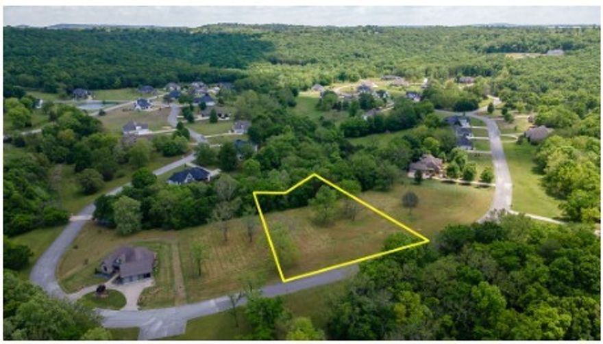 Don't let your chance to build in one of East Fayetteville's most desirable neighborhoods pass by. This wonderful 1.08 Acre lot in the Knolls is a dream sight. It features open, level ground, making it perfect for a variety of home designs. Electric, water, and gas are all conveniently located on the street. This is a wonderful neighborhood with fantastic amenities including a pool, tennis and pickleball court, pool house and walking trails. This is a great location with plenty of space to build your dream home.