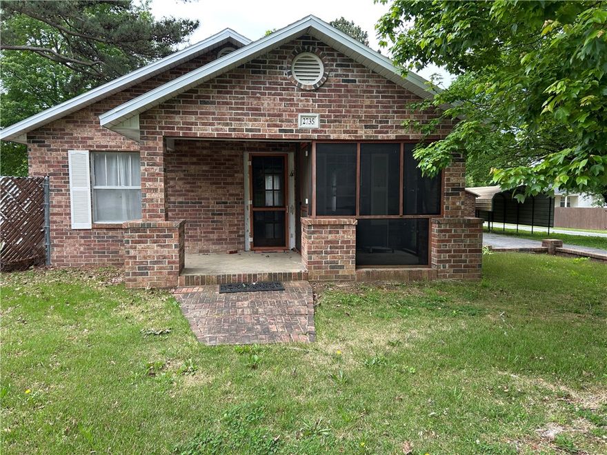 Charming 2 BR, 1 BA all brick cottage with screened porch. Home is 1129 s.f., central H & A and lovely sunroom. On a 1/2 acre lot, the property includes 2 workshop/storage buildings - great potential for a studio or ADU. Quiet neighborhood with great access to downtown Fayetteville and the U of A.