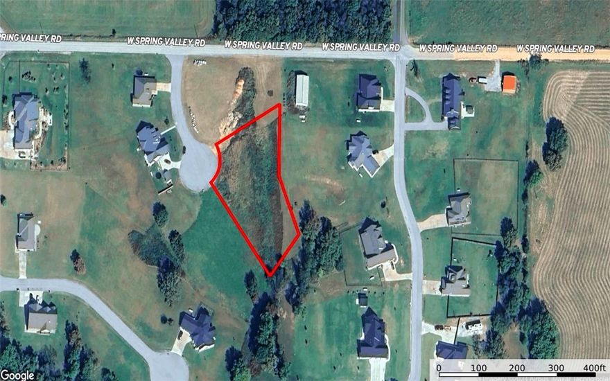 This 0.99-acre building lot is located in the rural subdivision of Moonlight Valley, conveniently situated between Centerton and Gravette. The neighborhood offers a peaceful setting while still being close to town. Homes in this subdivision are required to meet an 1,800 sq ft minimum, helping maintain quality and consistency throughout the community. Located just 11 miles from the Walmart Home Office in Bentonville, this property offers an easy and convenient commute while allowing you to enjoy the quiet of country living.