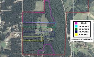 Beautiful land fronting McGuire Road just north of Lamar City Limits. ***THIS PARTICULAR TRACT IN YELLOW ON AERIAL PHOTO AND IS 52.81*** separate/private driveways and house site roughed in. Tract is private, abundant wildlife, city water available (East Johnson County Water) at Highway #123. Lamar School District. Beautiful location that isn't far from Clarksville/Lamar city limits, but secluded.