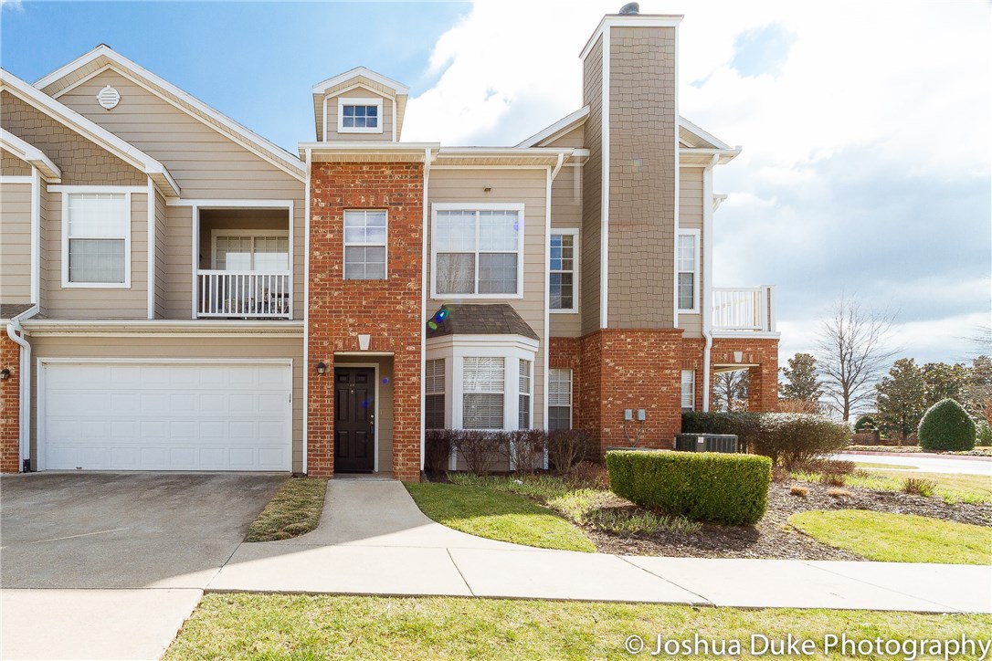 Easy living in Uptown Fayetteville. Chic 2 bed/2 bath condo w/ ATTACHED 2 CAR GARAGE at the Reserve at Steele Crossing. Features include: wood burning fireplace in living room, granite counters in the kitchen & marble in the bathrooms, 1 1/2" wood blinds throughout, 2 balconies, SS appliances, modern light fixtures, and so much more! Full access to all the Reserve's amenities, walking distance to the trail system, restaurants, shopping, entertainment, and mere minutes to I-49, U of A, & downtown Fay!