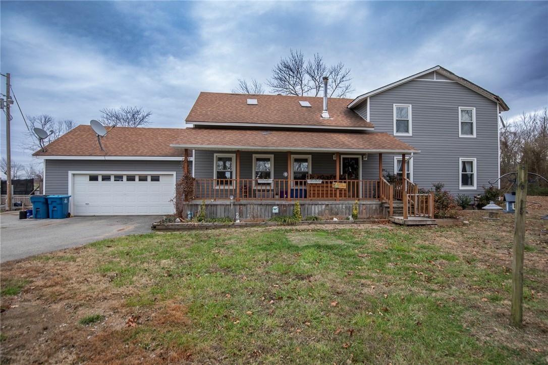 1 home is rented as a duplex, the other home is single family owner occupied. 2 ponds one more like a lake and stocked with plenty of catfish. Prime location in coveted area of Bentonville. Great place to invest in. Possible owner finance terms to be determined.