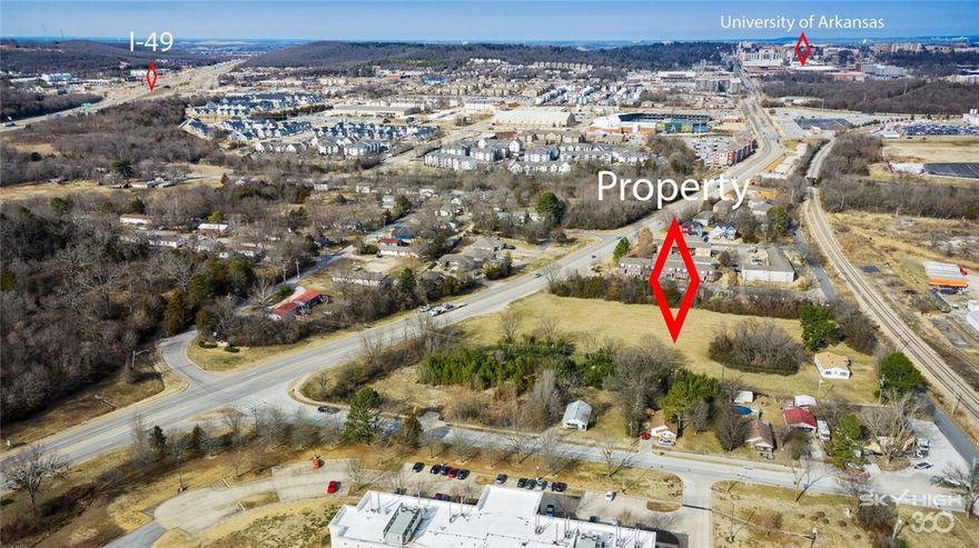 Phenomenal location and zoning for this 3.5 acre MOL parcel.  Zoned Community Services which allows by right up to 5 story structures, 18 ft minimum lot width.  Existing Right of Way can connect Razorback Rd to Vale St. with approx. 500 ft width on each side of improved street.  Located within the Opportunity Zone.  This is one of the first properties traffic entering Fayetteville will see coming up from I-40 and getting off the Cato Springs exit to access the UofA campus.  Would be a perfect location/site for a multifamily student housing development, a mixed use project, multiple cluster housing project, or a dense narrow/tall town home concept.  Lots of options.