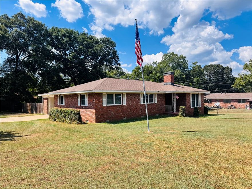 This is a solid & move in ready home that still has more potential to offer!
A charming home with great bones & timeless character. Sitting on a spacious,fenced corner lot w/ beautiful curb appeal & is ready for its next chapter.
The roof is just 9 years old, the HVAC system is less than 2 years old & the windows have been replaced,giving you peace of mind on the big-ticket items.
Inside, you'll find generously sized bedrooms, original hardwood floors, no popcorn ceilings & absolutely no carpet.A cozy wood-burning fireplace adds nostalgic charm, while the double carport & ramp access provide convenience and accessibility.
Step outside to a large,fully fenced backyard,offering privacy & plenty of space for entertaining or gardening.This home is truly move-in ready, yet priced to allow room for your own updates and renovations making it a perfect fit for first,second-time buyers or anyone looking to personalize their space. 
Located in a highly central part of town,you'll have easy access to everything you need.
