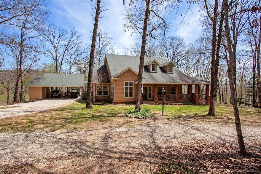 Picturesque horse/cattle farm nestled in the Ozark hills, minutes from I-49. Covered, lighted riding arena. 9 priefert stalls, some with turn-outs, living quarters for trainer. 2 loafing sheds, cross fenced for multiple pastures. 3 ponds, creek with seasonal waterfall. Great fishing & hunting. ATV and horseback trails throughout the property. See additional ML #'s 1080270 & 1080408.
