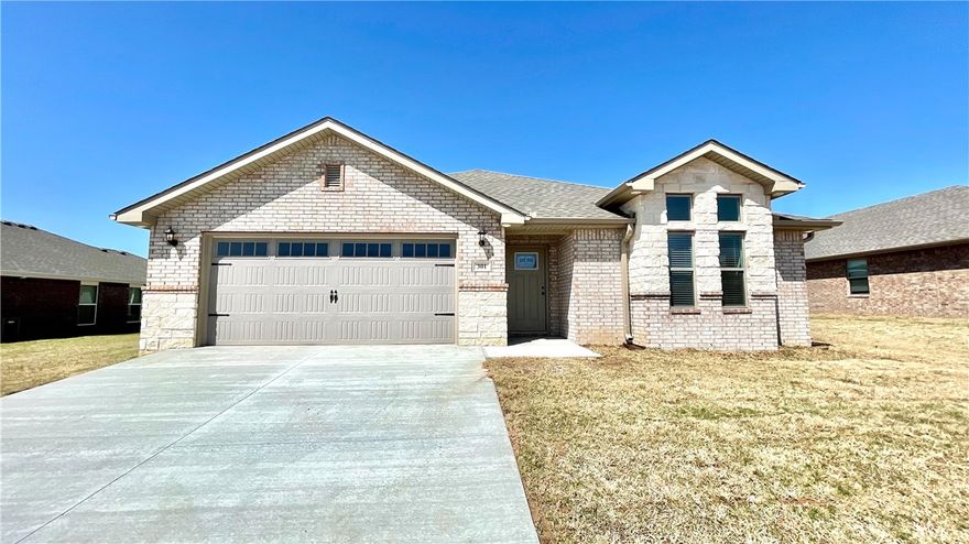 Experience the perfect blend of style and functionality in this 3-bed, 2-bath home. The split floor plan boasts an expansive, light-filled open area encompassing the living, dining, & kitchen spaces with sleek quartz countertops & separate pantry, while the oversized custom coffee bar offers a dedicated space for your morning routine & additional storage. Flooring includes durable ceramic wood-look tile through the main living areas & plush carpeting in the bedrooms. Built-in cubby storage located near the laundry room. Primary suite boasts a large bedroom & en-suite bath with dual vanities, walk-in shower, & two walk-in closets. Covered patio is ideal for relaxation & entertaining in the privacy fenced yard.  Street parking is prohibited after 8 p.m. No boats, trailers, RVs, large work trucks above three tons may be parked anywhere on the property. No smoking, pets, above-ground pools or basketball goals allowed. Tenant responsible for utilities, lawn maintenance, pest control, & renter’s insurance.