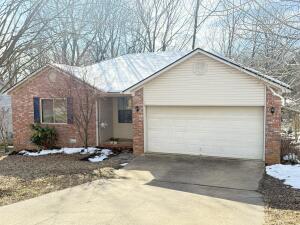 Welcome to your move-in ready dream home! This 3 bed 2 bath, 1288 sft +/-, one owner, meticulously maintained and cared for, freshly updated brick residence offers a plethora of updates including: new paint, new flooring, new light fixtures, new blinds, new window, new smoke detectors, 1 year+/- old water heater, 4 year+/- old roof, 6 year+/- HVAC system Nestled in a quiet, family-friendly neighborhood, this home features a split floor plan, gas burning fireplace, stainless steel refrigerator, dishwasher, range, microwave, 2 car garage, partially deck attic for storage, walk-in crawl space with storage shelving, vapor barrier, covered and private rear sunporch, covered storage area, gazebo and brick paver patios, landscaping and all of this just minutes from town!