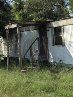 Fixer upper! Country property with an older moblie home ready for you to flip or build your new home.