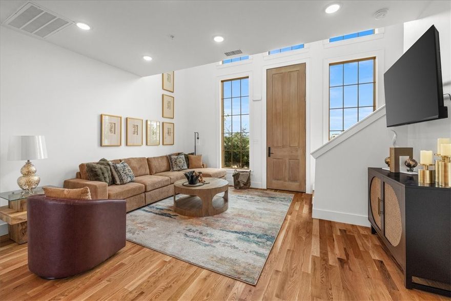 Stay in the Heart of it All. This semi-custom townhome blends modern design with everyday comfort. You’ll love the tall ceilings, rich hardwood floors, confrontable furnishings and stylish finishes throughout. Step outside and you’re walking distance to restaurants, coffee shops, live music, and the Razorback Greenway trail system. Whether you’re in town for work, a concert at the AMP, or a weekend getaway, this is the perfect spot to relax and enjoy everything Northwest Arkansas has to offer