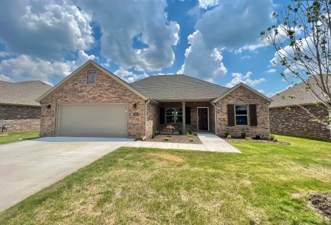 Sold before print. Pictures not of actual home but of another home of same floor plan.
Beautiful 3 bed/2 bath Birchwood-Plan in our wonderful Hickory Meadows Community in Tontitown! This home boasts an open floor plan with custom cabinets, granite countertops, community amenities (pool and playground), and crown molding throughout are just a few reasons why you'll love this home! You will love the hardwood floors in the dining area. Picturesque kitchen with beautiful white custom made wood cabinets is sure to be a wonderful place to entertain or just hang-out! The Master Bedroom features a separate whirlpool tub and shower with a generous-sized walk-in closet. Call us today to schedule a tour, as it will not last long! 15 minute drive from Tyson Headquarters. *Seller does not provide or install gas logs for liability reasons.