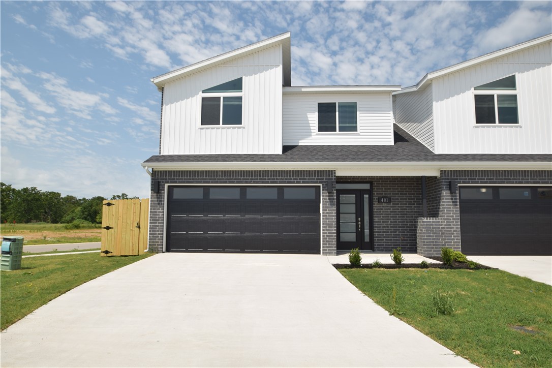 New modern design duplex! Also included brand new side by side stainless refrigerator, washer and dryer. This 3 bed 2 1/2 bath plan has an open living concept with tall ceilings and tons of natural light. Kitchen has granite countertops, stainless appliances, a large pantry, and a gas range. Primary suite is on the main floor and has a beautiful walk-in shower and a large walk-in closet. Two bedrooms upstairs with a full bath and landing area. Wood look tile in main living areas, 2" faux wood blinds, extra storage in the upstairs attic. Property has a private back patio and wood privacy fence. Owner must approve pets and no smoking.