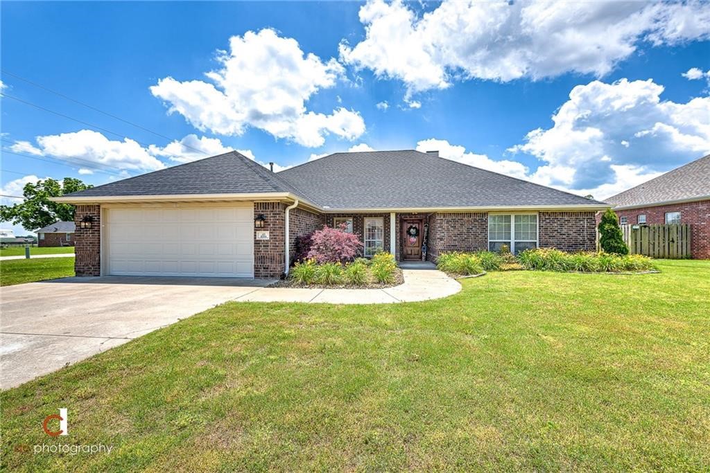 Investment opportunity. This beautiful one level, four bedroom home is turn key and is already rented for 8 months at $1800 a month. The tenant paid for a full year in full as well as $1800 deposit, both will be transferred to the new owner. The tenant is also interested in renting for another year when his lease is up 8-1-2022. The home is updated and extremely well maintained, shows like a new home! 10 foot ceilings, fresh paint. Updated kitchen with quartz countertops, backsplash, bread new appliances (refrigerator conveys) This home showcases this open concept and split floor plan. High end tile wood floors are featured throughout the home, extremely durable, perfect for a rental. Fenced in back yard, all brick, new roof (installed late 2020), brand new garage door and brand new hot water heater and brand new HVAC installed by pascal September 2021. Excellent condition and location! Less than a mile from Bentonville West High school. No showings until fully accepted offer due to home being occupied by tenant.