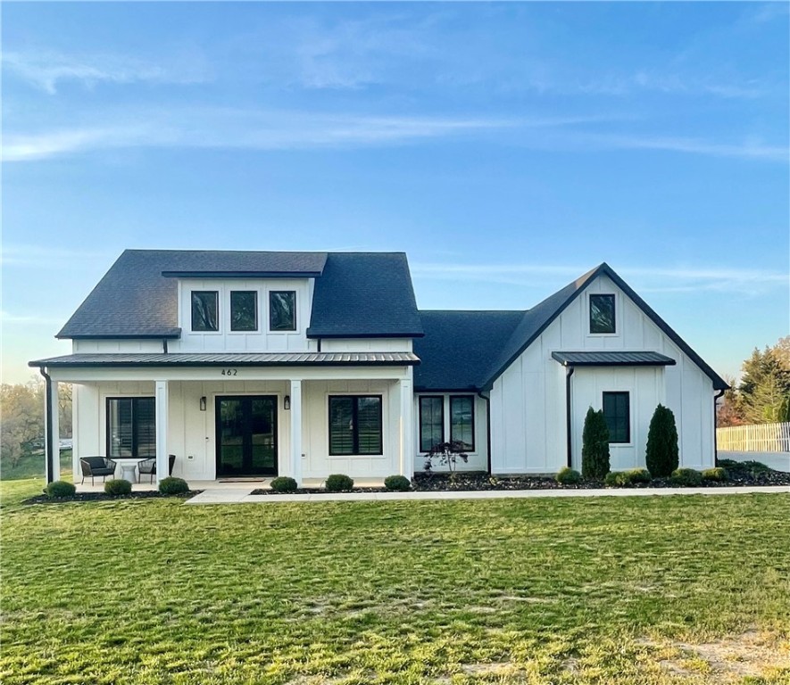 Agent Owned / Occupied. 2 year old modern farmhouse on 1.7 acres in Bentonville school district. 3 bedroom 2 bath custom home with a beautiful layout and modern amenities. Some of the perks include a 30x50 shop with water and electrical hooked up, solar panels, and an unfinished 2nd floor that could be an additional 1900 sq ft. 2nd floor sample plans attached for reference. Some of the upgrades include - casement windows, GE Cafe Platinum Glass Appliances, Quartz countertops, shutters and blackout shades throughout, custom hand made cabinetry throughout including all closets, invisible dog fence, beautiful custom 8ft double doors, and a 2nd floor patio. Enjoy the solitude and space of country living while having the proximity and school district of city living. 10 Minutes from pinnacle promenade and 20 minutes to Fayetteville and downtown Bentonville.
