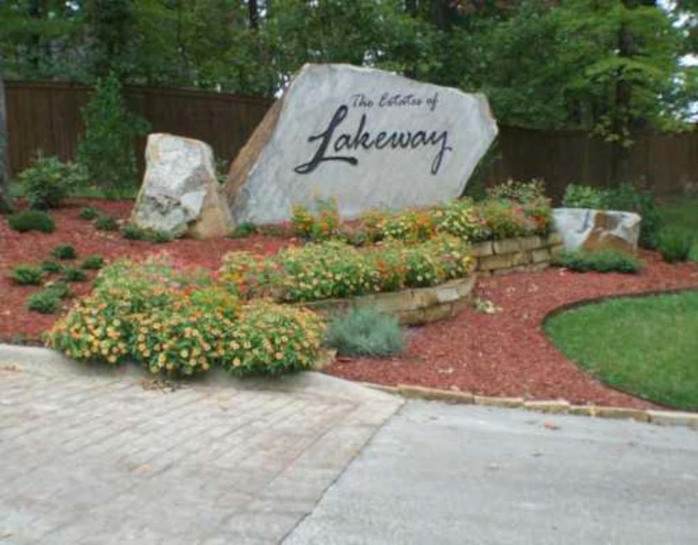 THIS LOT HAS A BEAUTIFUL LAKEVIEW. IT'S LAKEFRONT AND ZONED FOR A DOCK. IN A GATED SUBDIVISION 10 MINUTES FROM ROGERS.