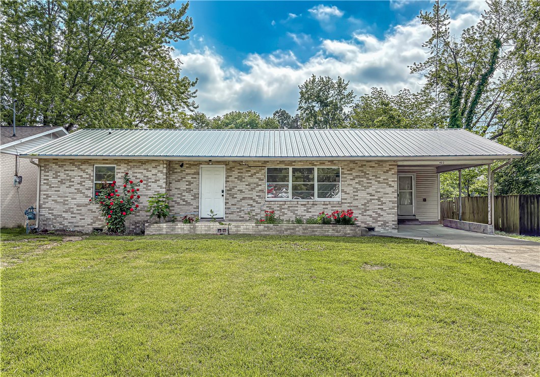 This warm and welcoming 4-bedroom, 2-bath home offers space, charm and just the right updates-all tucked on a generous lot with room to spread out. The original wood floors add timeless character, and the private primary bedroom is thoughtfully set apart from the others.
You'll love the fresh updates in the kitchen and bathroom, new HAVAC, along with paint, flooring, hot water heater, and more. Step outside to a new deck, a detached garage with workshop space and a backyard with easy rear access-perfect for pulling in extra vehicles. The spacious driveway offers plenty of parking, making this home as practical as it is cozy.
Move-in ready and full of personality, this home is ready to welcome you!