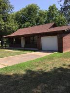 MOVE IN READY.......REMODELED TO LIKE NEW...new roof, new flooring throughout, new appliances, new deck and walk to the Daycare next door, ball field, community center, police department, church and centrally located to so much more.