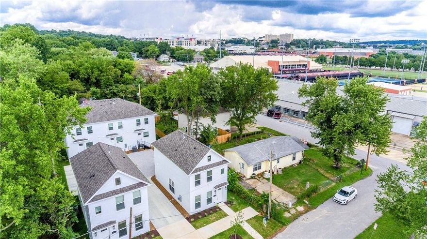 Amazing opportunity to own 2 homes located just steps away from the U of A campus!  Walk to campus, football/basketball games, trails, and more!  Both homes feature high-end finishes throughout, including wood floors that flow seamlessly through the open living spaces and bedrooms, with tile accents in the bathrooms. The gourmet kitchens feature a gas range and stainless-steel appliances, making it ideal for both everyday meals and entertaining. The quartz countertops and custom-built cabinets that reach the ceiling add both style and functionality to the spaces. An abundance of natural light flood the homes, creating a warm and inviting atmosphere. These homes offer not only comfort and style but also an unbeatable location—perfect for students, professionals, Razorback enthusiast, or anyone looking for the best of what the area has to offer! Fridge, washer, & dryer, included! Listing is for 1632 and 1638 W Neptune street.   Can purchase each unit fully furnished if desired.
