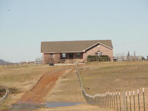 Rare find in Searcy County, AR: Level, horse ready property with nice all brick home, level yard and 360 views & privacy with nearest neighbor being 1/3 mile away. Buffalo National River is only 6 miles away where you can have the best of nature at your fingertips in only minutes. There you can enjoy horseback riding, hunting, fishing, floating, hiking, camping & swimming. 5.5 to Snowball & 13 to Ozark National Forest. New HVAC system 2021, hardwood & tile floors, huge den/family room with laminate floors