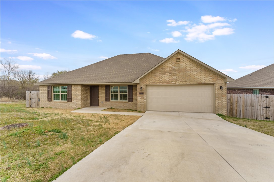 Beautiful country setting conveniently located in the middle of NWA. Located in a Rural Development area, so qualified buyers could move in with NO DOWN PAYMENT! Come see this beautiful 4 bedroom, 2 bathroom home on one-third acre lot. Move into 1,688 sq feet of practically new construction, Split floor plan. Beautiful dark stained cabinetry and flooring provide a sense of elegant living throughout the home. Attached 2-car garage and ample closet space in each room. These homes include: granite counter tops, Full Blinds, Stainless steel appliances: Range, Dishwasher, Microwave AND Refrigerator! Plenty of room to entertain inside and out! Make an appointment to see today!