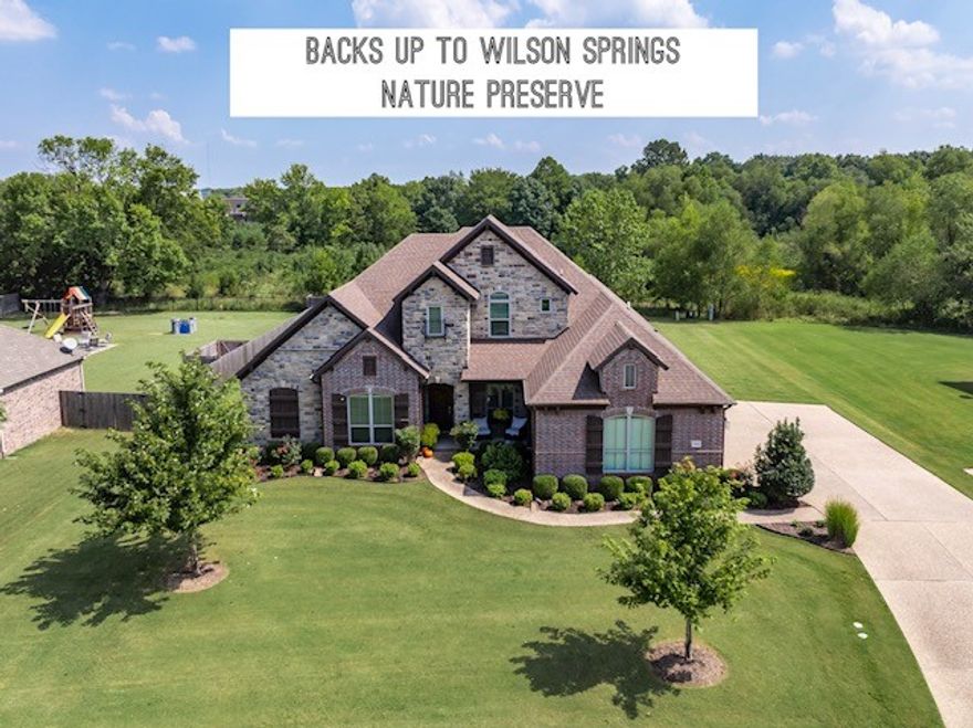 Premiere lot!!  Backs up to protected land at Wilson Springs Reserve, so no one will ever build behind you.   This beautiful Buffington built home gives you the best of both worlds-just minutes from all the Fayetteville conveniences, yet backing up to a peaceful nature preserve. Underwood Park and the Razorback Greenway right out your front door.   An entertainers dream with over 1100 sq/ft of deck and covered patio space.  The home has been lovingly cared for, with cheerful windows that fill the rooms with natural light and welcoming spaces perfect for gathering with family & friends.  Primary bed on main level w/ 2 secondary bedrooms on their own separate hallway w/ full bath. Upstairs, you'll find a wonderful secondary living space featuring an oversized bedroom, full bath, & bonus area- an ideal setup for adult children attending college, or a private retreat.  See attached list for Property highlights.