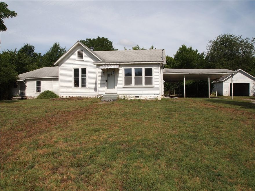 Home overlooks Mission Blvd and is in the heart of Fayetteville.  Walking distance to Root Elementary, Wilson Park, Square, and Dickson St.  This is a fixer upper on a big .61 acre lot with secluded feeling back yard.  Comparable updated homes are have recently sold for approaching $200 SF.  Great way to earn "sweat equity" or a solid flip home.