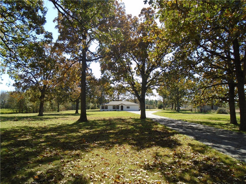 Spacious home with mother in-law suite, 4 bedrooms, office, and 3 bathrooms. Eat-in kitchen, new stainless steel appliances, fresh paint, and fireplace. Covered patio. Enough fenced acreage ready for you livestock. Great location, just 5 minutes to I49, shopping, and hospital. Also great schools.
Also see 1130593 and 1130754