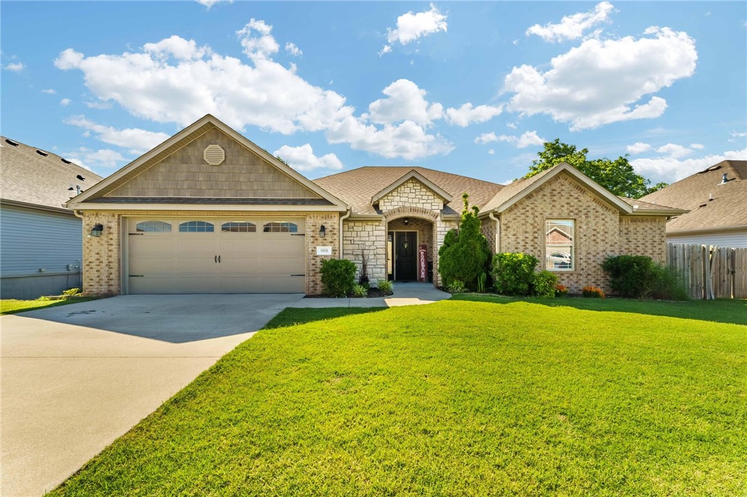 Welcome to this exceptional builder’s home, thoughtfully designed with standout finishes and impressive attention to detail. Step inside to discover wood-look tile flooring that combines durability with elegance, setting the tone for low-maintenance living. The kitchen is truly a showpiece—complete with quartz countertops, a custom tiled backsplash, stainless steel vent hood, rich custom cabinetry, and a large island perfect for hosting.
Every bedroom boasts a walk-in closet—an uncommon luxury at this price point. The laundry room is equally functional and stylish, featuring ample cabinetry and a dedicated sink. A rare mudroom with built-in cubbies and a convenient half bath adds even more value.
Enjoy peaceful mornings or evening gatherings on the east-facing covered patio, backed by a treed landscape for added privacy. This home blends practical living with upscale features—don't miss the opportunity to make it yours.