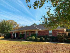 This tranquil retreat, nestled on a picturesque 1.53-acre corner lot, offers a serene escape for growing families. This 3-bedroom, 2-bathroom home boasts an elegant brick exterior and premium amenities. Relax by the sparkling inground pool, unwind in the fenced-in backyard, tinker in the 21x25 shop, or explore the quiet, Fox Run neighborhood of Pottsville. With central heating and cooling, an attached 2-car garage, and beautiful landscaping, this property is your personal invitation to peaceful living. Don't miss out. Contact us today for a showing.