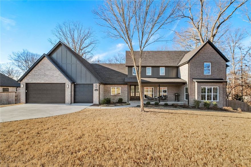 Nestled on 1.2 Acres in the coveted Timber Ridge Estates with a completely fenced backyard and a short 15 minute drive to the New Walmart Home Office. Custom blinds throughout, abundant natural light, open concept living, with soaring ceilings and and a Private Office space on the main floor with abundant light and a sliding door. The Master suite includes a gas log fireplace, wooded backyard view, soaker tub, tile and stone shower, and large walk-in closet with adjacent laundry room. Spacious Kitchen with oversized island, Gas Cooktop, custom cabinetry with soft close doors and drawers, granite countertops, and a large Walk-In Pantry. Outside, enjoy your covered front Patio and back porch along with the Salt Water Hot Springs Hot Tub and the large extended patio with pergola. Upgraded home systems including Reme Halo Ultraviolet air cleaner, tankless on-demand water heater,  large walk-in attic storage space that could easily be turned into a heated and cooled ManCave and an oversized 3 car garage.