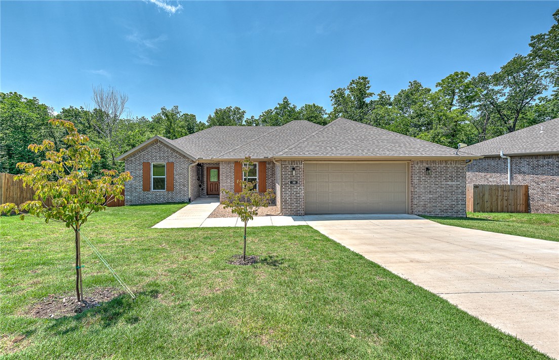 Welcome to your dream home in scenic Bella Vista! This beautifully maintained 3-bedroom, 2-bath home is better than new and truly move-in ready. Unlike many Bella Vista properties with steep drop-offs, this yard has been thoughtfully re-graded to provide usable, inviting outdoor space on its .36 acre lot. Inside, you’ll find granite countertops throughout, elevating both the kitchen and bathrooms with a touch of modern luxury. The home has been thoughtfully updated with a new induction range, porcelain tile throughout and added cabinetry in the laundry room and bathrooms, offering extra storage and functionality. Every inch of this home has been lovingly cared for, with meticulous attention to detail and pride of ownership evident at every turn. Washer and dryer convey. Enjoy the peaceful surroundings of Bella Vista while being just minutes from trails, lakes, golf, and all the amenities that make this area so desirable. Don’t miss this opportunity—schedule your private showing today!