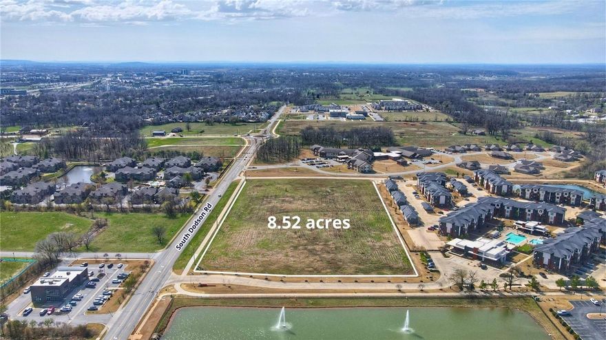 Land for sale strategically positioned on the Rogers/Bentonville border along South Dodson Road near I-49. This +/- 8.52-acre development opportunity presents a rare chance to deliver a high-quality residential and mixed-use community — featuring apartments, townhomes, multi-unit homes, and ground-floor commercial — within one of Northwest Arkansas' most rapidly growing and lifestyle-driven corridors, steps from the Razorback Regional Greenway, minutes from Walmart's global home office, and adjacent to the prestigious Pinnacle Hills district.