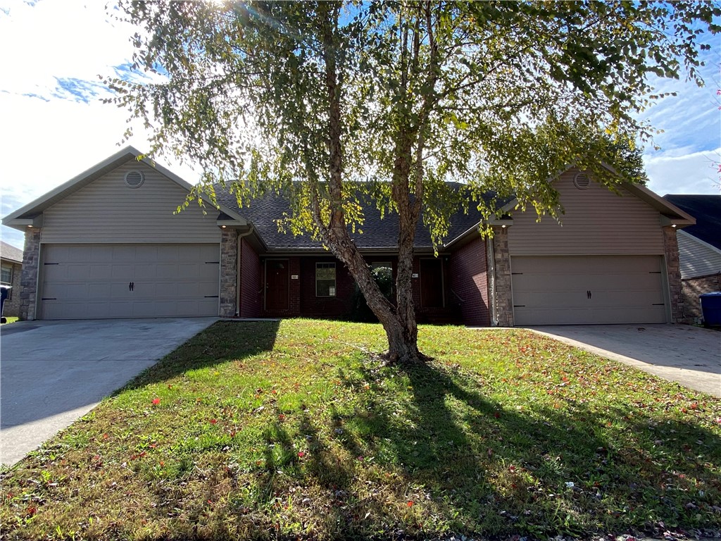 Spacious 3 bedroom, 2 bath duplex with 2 car garage! All appliances included.
