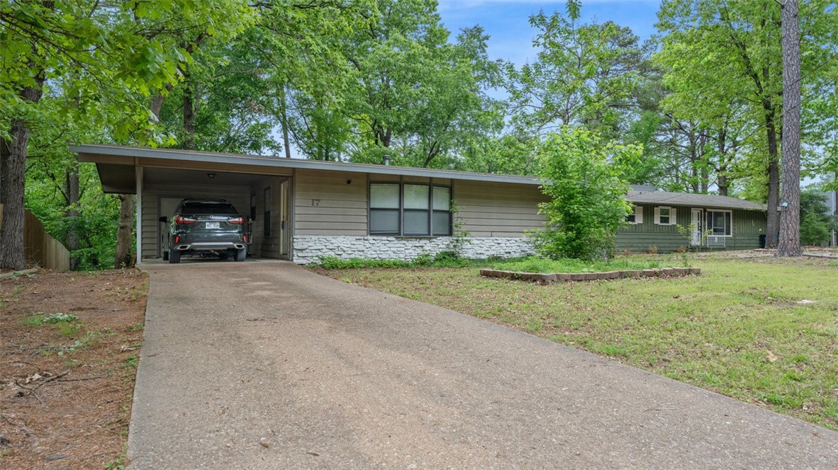 Seller is offering $5,000 in concessions! Welcome to 17 Grisham Drive, a cozy 2-bed, 1-bath home nestled on an oversized .32-acre lot in the heart of beautiful Bella Vista! This inviting home offers a comfortable layout with a light-filled living room that seamlessly flows into the kitchen. Enjoy the peace & privacy of your spacious yard. With this home being located just minutes from Lake Avalon, Tanyard Creek, Bella Vista Country Club, Walmart, & easy access to the interstate, youāll love the convenience of nearby amenities. Plus, this home is located in the highly sought-after Bentonville School District, making it a great choice for families or investors. Whether you're a first-time buyer, downsizer, or looking for a rental opportunity, this charming property has so much to offer.