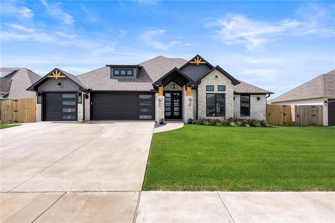 Modern Craftsman Gem in Growing Pea Ridge! Located in a rapidly developing area this stunning modern craftsman-style residence is less than a year old & packed w/ high-end features & thoughtful design. Step inside to an airy, light-filled interior w/ durable LVP flooring throughout. The open split floor plan offers both functionality & style, features Gourmet kitchen w/ quartz countertops, SS appliances, gas cooktop w/ pot filler, walk-in pantry, large island, & decorative tile. Spacious dining area accented by wood beams for a warm, rustic touch. Versatile 4th bedroom ideal for a home office or guest suite. 3-car garage w/ utility sink, side entry, & attic storage. Enjoy outdoor living in the beautifully designed backyard, perfect for entertaining w/ a vaulted covered porch, cozy firepit, & an extra patio for soaking up the sun. Located just minutes from the upcoming Elkhorn sports complex & the new 66-acre city park, this home offers easy access to I-49 & is only 15 minutes from both Dwtn Bentonville & Rogers.