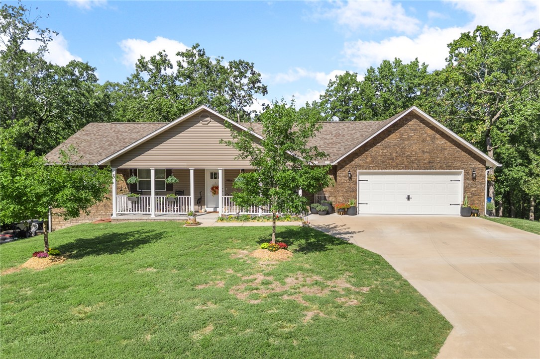 Built in 2021, this 3,200 sq ft home on 3.95 acres blends comfort and style. Inside you'll find cathedral ceilings, granite counters, and a warm open layout perfect for gathering. The finished walk-out basement adds a kitchenette, bedroom, bathroom, flex room, plus a 3rd garage. With a covered deck for entertaining, raised flower beds, and a whole-house Generac, this property is ready to welcome you home.