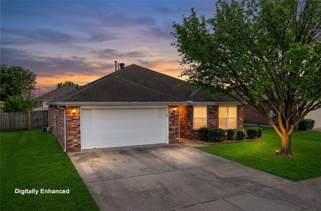 Single story all-brick home with gutters, 2 car ga