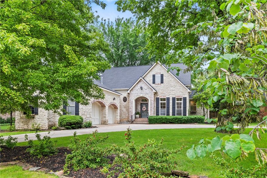 Exceptional European-style custom home with limestone exterior on corner lot in East Fayetteville’s most walkable neighborhood. Four bedrooms, three and half baths plus office. Master bedroom on main.  Home features 10’x30’ covered deck, expansive sliding glass doors looking into the professional landscaped yard with mature trees. $67,000 in upgrades including new HVAC, water heater, irrigation & landscaping. New roof in 2020. Covington Park features a neighborhood park & playground, community events, and is walking distance to Vandergriff Elementary & McNair Middle School pickleball courts and running track. Golf cart friendly neighborhood. Walmart, Harps and local restaurants are only a couple minutes away.