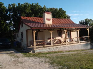 Home is being sold AS-IS due to needs finish work inside. Basement has framework for extra bedrooms & has a 2nd bathroom started. Extra building out back with a carport could be storage or made into an extra apartment or Mother-in-law quarters. All numbers approximate.