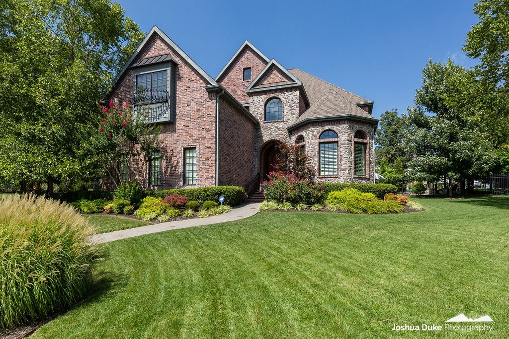 Welcome home! This stunning 5 bedroom 4.5 bath beauty located in the gated community of Clear Creek will not disappoint! One of a kind custom build boasts an open floor plan, cathedral ceilings, hardwood floors & amenities galore. This luxurious executive home features high end finishes, new interior paint in 2016, crown molding throughout, beautiful arched windows w/ plantation shutters, Formal Dining, & Breakfast Nook. Kitchen has lovely fixtures, granite countertops, stainless steel appliances, gas range, & a large bar for seating. Master Suite features such details as triple crown molding, his & her vanities, a tiled walk-in shower, & a jetted tub. Large additional bedrooms have access to a private bathroom & bonus room can be used as a 5th bedroom. The outdoor features of this fabulous home are an entertainer's delight! Grill or make pizza in the outdoor kitchen, sit around the fire on the covered patio, or relax on the hanging swing in the gazebo. Enjoy the heated in-ground saltwater pool for years to come!