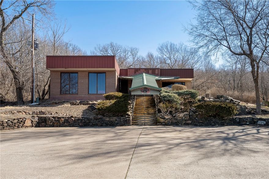 Special Deal!! Fantastic location in central Fayetteville on N College Ave/71B. Established business in high traffic area, over 33,000 cars per day. A high school will be built near the back of the property. Commercial building currently being used as a restaurant with 1.2 acres. Building features full kitchen and seating for 74. 21 Tables, 54 chairs. kitchen equipment negotiable. New roof and road 2021. 2 new AC 2023,New floor 2023.