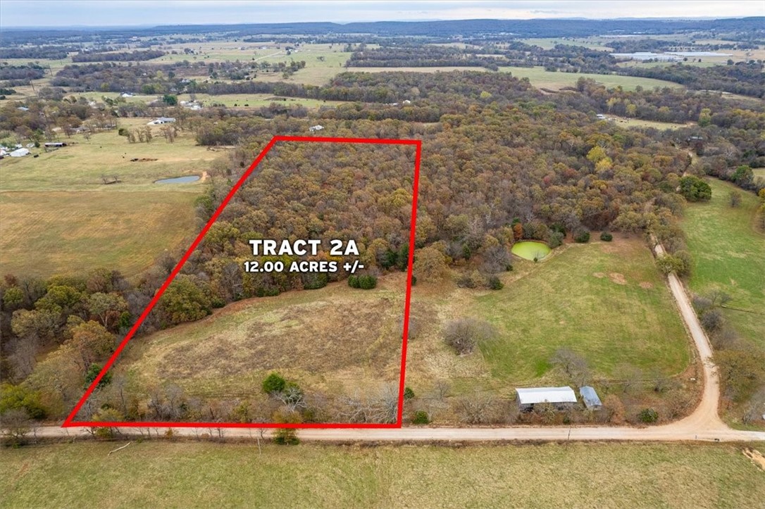 Discover 12 acres of untouched natural beauty, a perfect retreat for hunting enthusiasts or those seeking a private getaway. This expansive property features a mix of open pasture and mature woodlands, offering an ideal habitat for deer and other wildlife. Located just a short drive from Siloam Springs and Fayetteville, it provides the peace of rural living with easy access to local conveniences. Nearby attractions include the Siloam Springs Kayak Park and City Lake Park, adding even more outdoor adventure options. Whether you envision a hunting paradise or a versatile investment, this property offers endless possibilities.