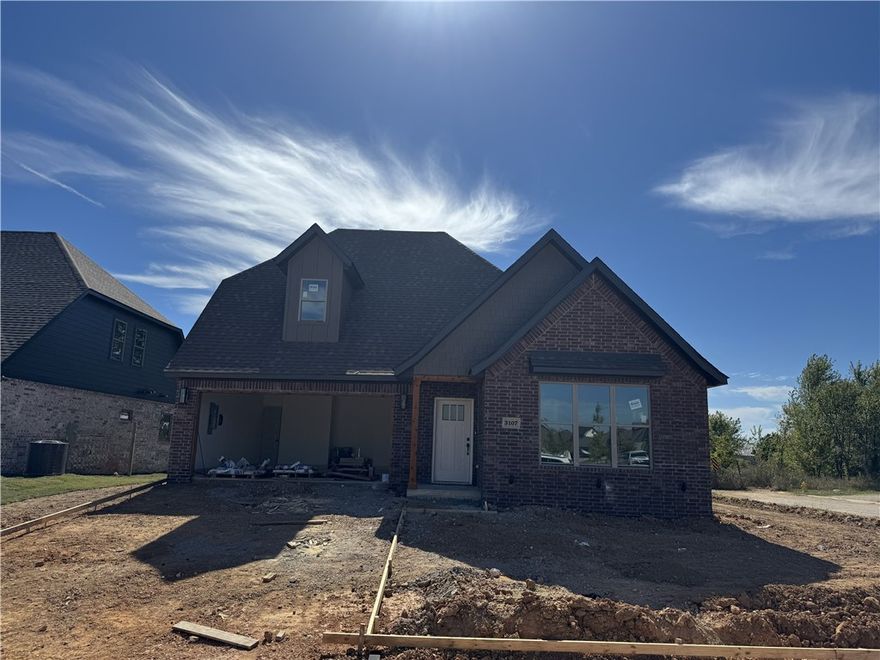 North facing new construction home in Woodlands Crossing that backs up to a field! Several of the features in this home include an upgraded 3 cm quartz counters throughout, upgraded tile, a designer brick fireplace, 4 disk lights in all of the bedrooms. Other amenities include custom cabinets with soft close hinges, stainless steel appliances with a designer gas range vented to the exterior, tall ceilings, low-e windows, designer lighting, luxury vinyl plank flooring, low-e windows, 2" faux wood blinds (not included on the small windows in the living room/primary bedroom), full privacy fence, full gutters with downspouts, irrigation system in the front and back w/ an exterior control, lots of trees and more! Preferred lenders are paying up to $5,000 toward closing costs, prepaids, or discount points.  Finished photos are of a similar finished home and colors and finished may vary slightly to this home.